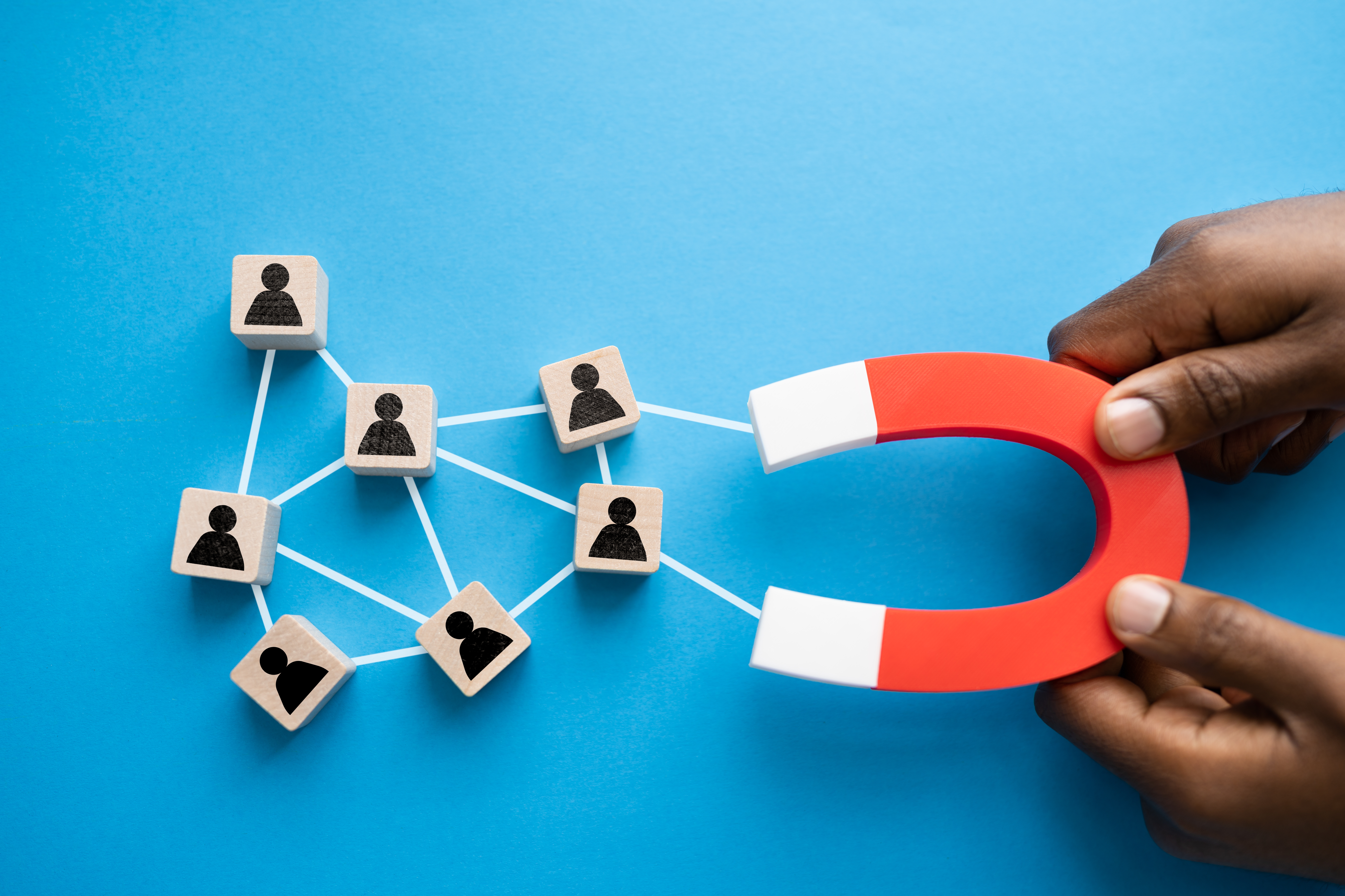 customer acquisition strategy illustration using magnet